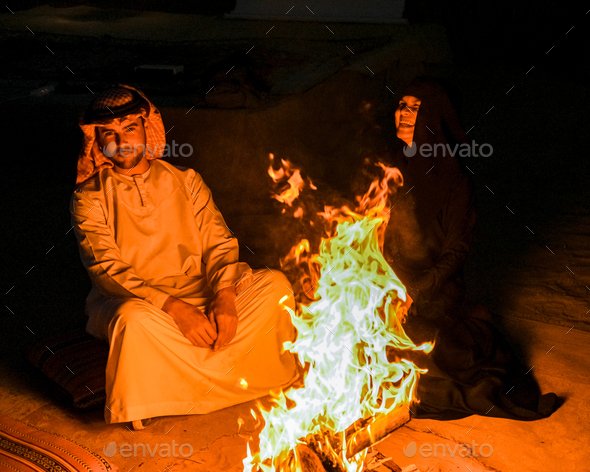 Couple with Arabic clothes during Dubai desert safari at the safari camp, Dubai United Arab Emirates