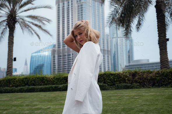 Young woman enjoying view of Dubai downtown. - Stock Photo - Images
