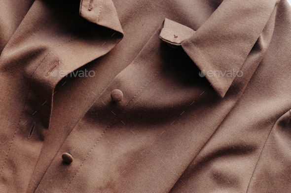 Brown women dress with collar and buttons. Women's stylish autumn or summer outfit - Stock Photo - Images
