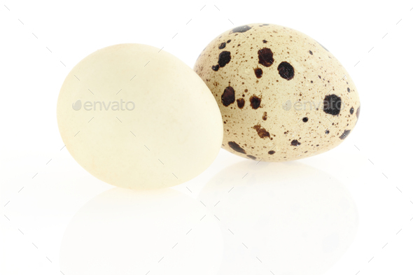 Quail eggs on white background. Damaged skin concept