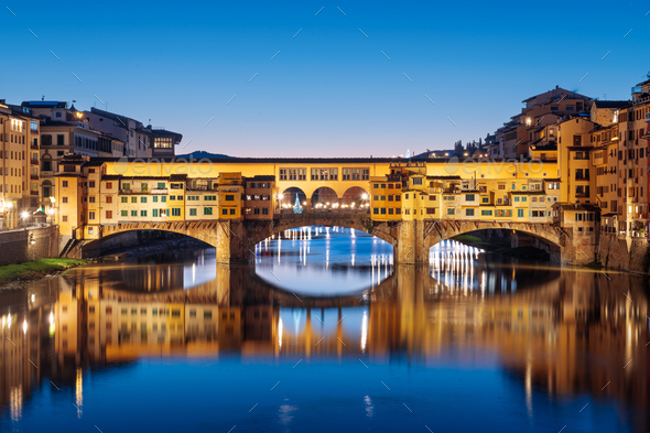 Florence, Italy at the Ponte Vecchio Bridge crossing the Arno River - Stock Photo - Images