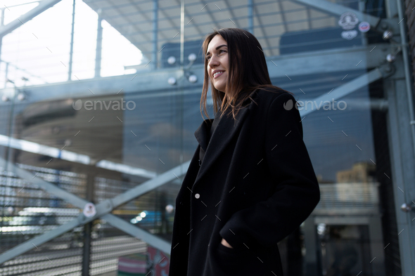 stylish woman anti-crisis manager on the background of a modern office building, organization
