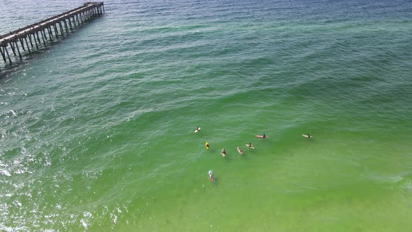 Florida Tourism - Popular Fun Vacation Spot in Pensacola Beach on Gulf Coast - Aerial Drone Establis alt