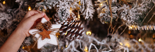 Banner decorated Christmas tree on blurred background. Stock Photo by