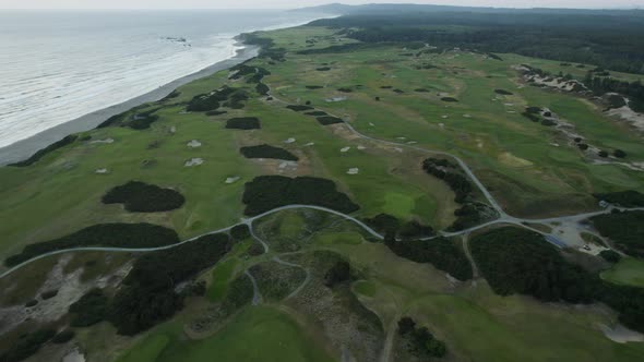 Aerial Establishing View over Bandon Dunes Golf Course on the Oregon Coast alt