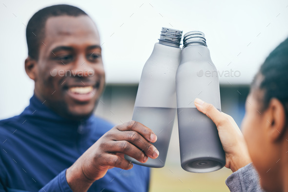 Fitness, water bottle and black couple toast outdoors together