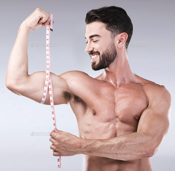 Premium Photo  Man body and tape measure on abdomen in studio on gray  background health fitness and male model with measuring tape for abs to  track exercise training results muscle goals or weight loss target