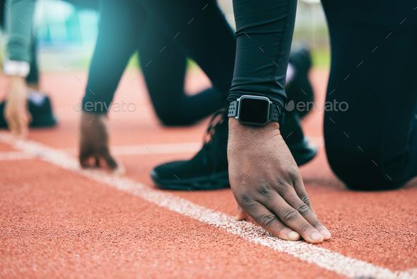 Athlete, runner and fitness person at start of a race on a sports track for exercise, workout or fi