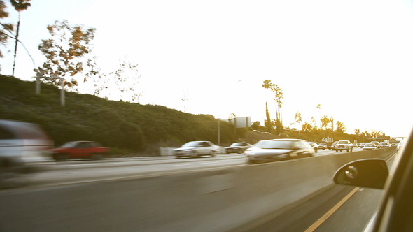 Oncoming Traffic on American Highway at Sunset