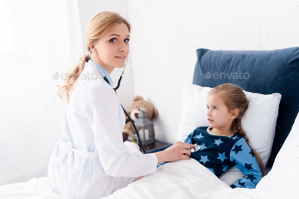 sick child with doctor