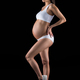 asian pregnant woman posing in white underwear, isolated on black Stock  Photo by LightFieldStudios