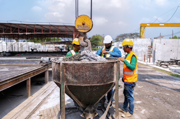 At Building Construction Site Supervisor Check Concrete Mold And Bucket 