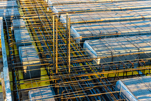 Concrete slab with reinforncing bars in construction site - Stock Photo - Images