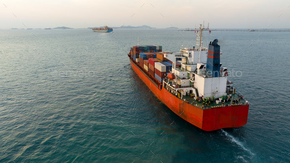 Cargo container ship with Pilot Boat sea freight carrying container and ...