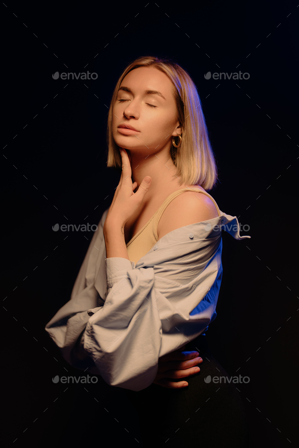 Attractive blond lady in studio Stock Photo by arthurhidden | PhotoDune