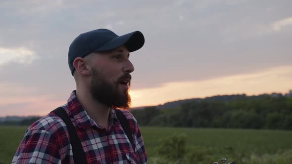 Handsome Man Plays on Giutar Ans Sings Cool Song alt