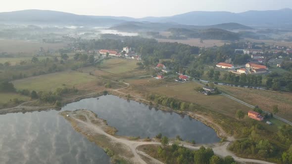 Aerial View of Medieval Palace in Mountains alt