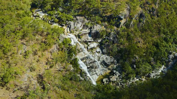 Aerial, A Waterfall In The Middle Of Rain Forest At Davies Creek In Queensland, Australia