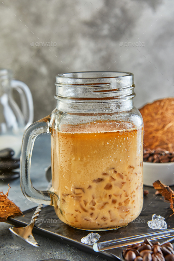 Thai Iced Coffee with Coconut Milk with Crushed Ice in a Mason Jar