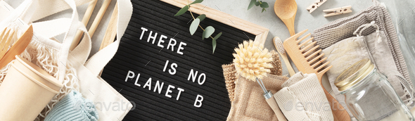 There is no planet b letter board and zero waste no plastic accessories on grey stone background