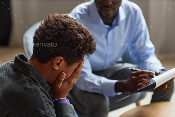 Crying Boy Visiting School Psychologist