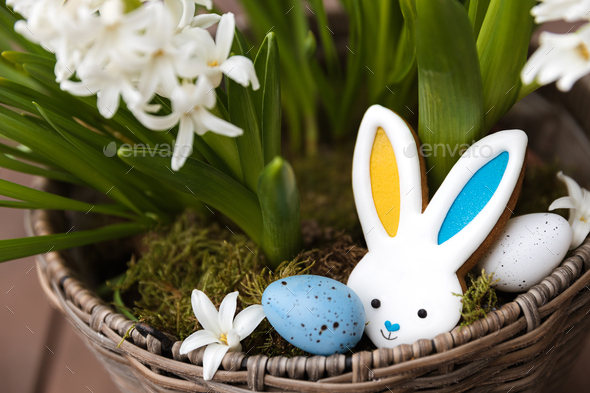 Easter bunny gingerbread cookie with ears yellow blue colored as Ukraine flag - Stock Photo - Images