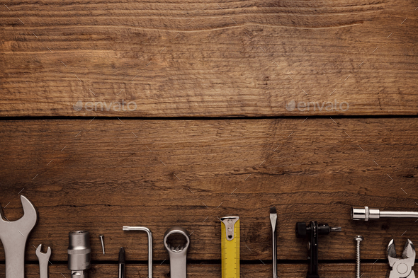 DYI composition of various work tools on wooden background flat lay - Stock Photo - Images