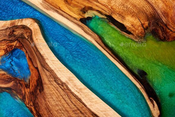 Texture of a wooden table with epoxy resin. Stock Photo by Sandsun