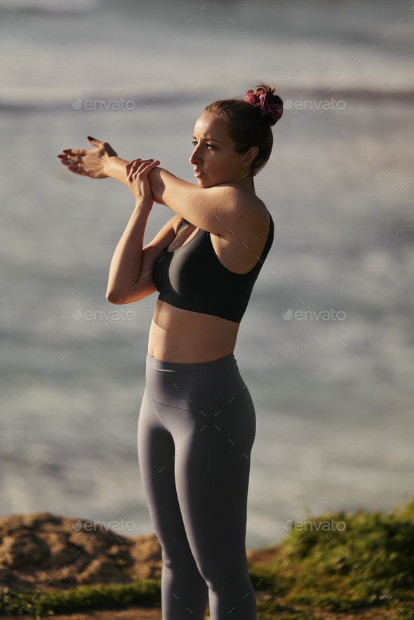 Slim | Stock by at ocean yoga PhotoDune doing Photo kegfire woman