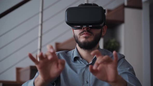 Man Using Vr Glasses and Working in Cyber Space at Home