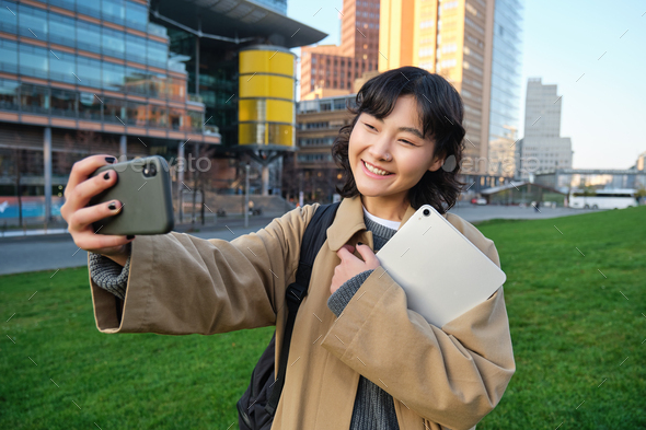 Free Photo | Excited asian woman showing okay sign stunning korean girl in  hat taking selfie