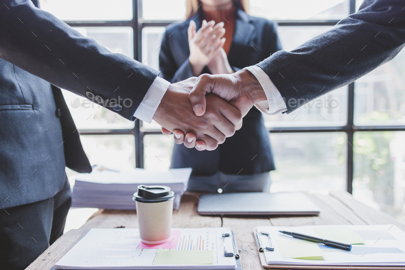 Business handshake for teamwork of business merger and acquisition,successful negotiate,hand shake,