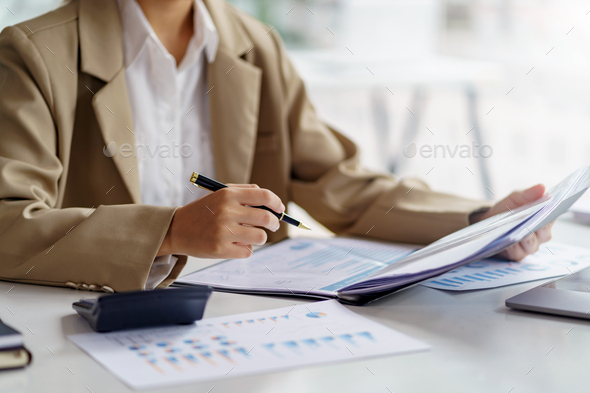 Businesswoman pointing at expense chart Budget management, income tax, financial statements, budget