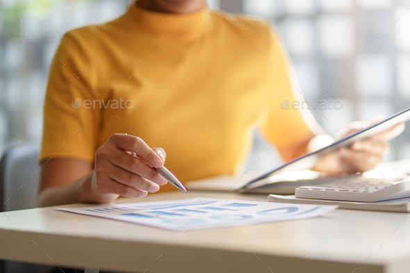Businesswoman pointing at expense chart Budget management, income tax, financial statements, budgets