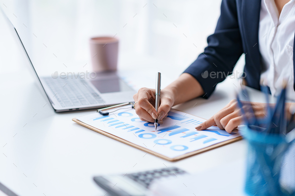 Businesswoman pointing at expense chart Budget management, income tax, financial statements, budgets