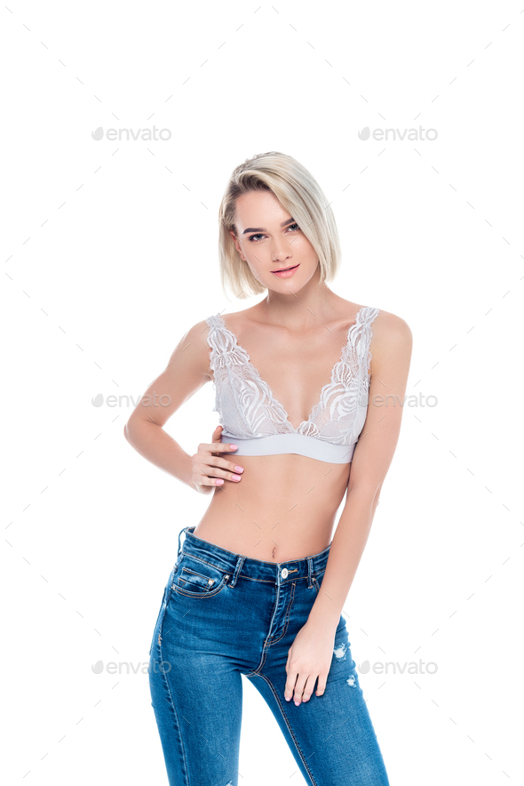 Beautiful Seductive Woman Posing In Lace Bra And Jeans Isolated On