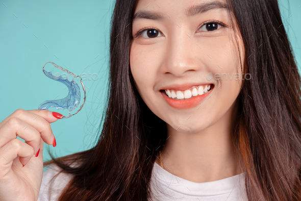 Dental Beautiful smiling of young asian woman with retainer braces ...