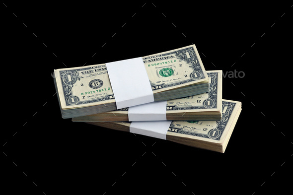 Bundle of US dollar bills isolated on black - Stock Photo - Images