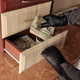 Robber in black outfit and gloves see in opened shelf in kitchen - PhotoDune Item for Sale