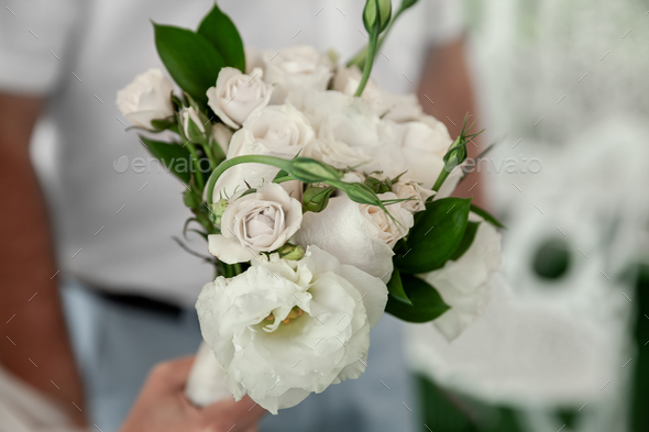 White bridal bouquet on Wedding day, fresh flowers for special event - Stock Photo - Images