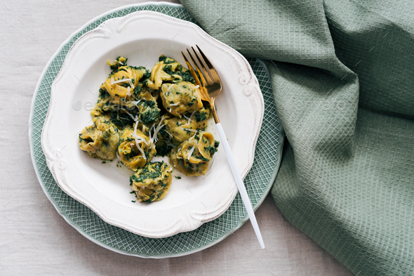 Beautiful served ravioli with spinach and cheese - Stock Photo - Images