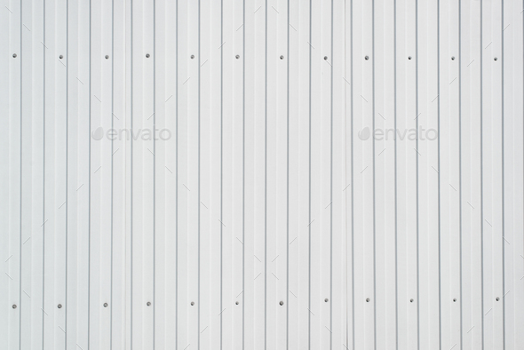 Steel gray corrugated profiled sheet, outdoor metal profile fence. Construction material