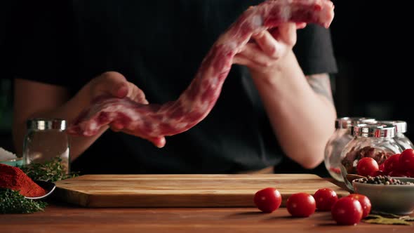 Woman Chef Cooking Ribs Closeup alt