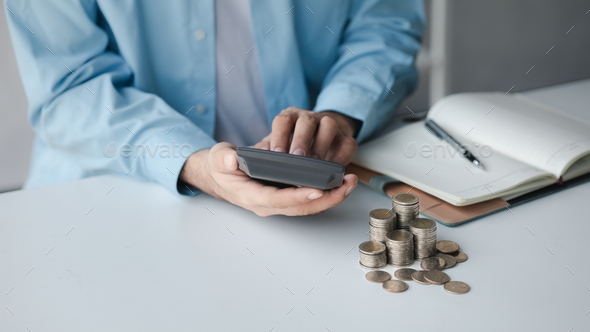 Person with stack of coins, saving money concept for future use and financial stability, savings for