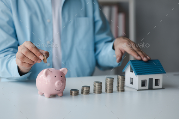 Person with stack of coins and piggy bank, saving money concept for future use and financial stabili