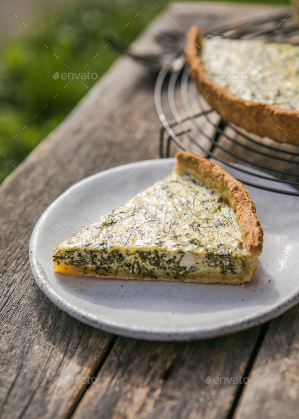 Quiche with spinach traditional dish of french cuisine. Spinach tart