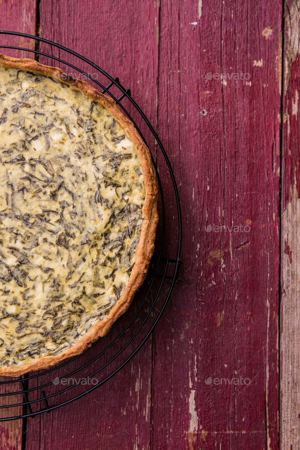 Quiche with spinach traditional dish of french cuisine. Spinach tart