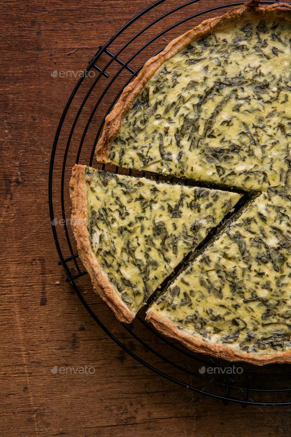 Quiche with spinach traditional dish of french cuisine. Spinach tart Stock Photo by sokorspace