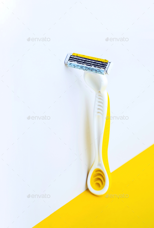 Used disposable razor for safe shaving. Female razor for daily personal hygiene.