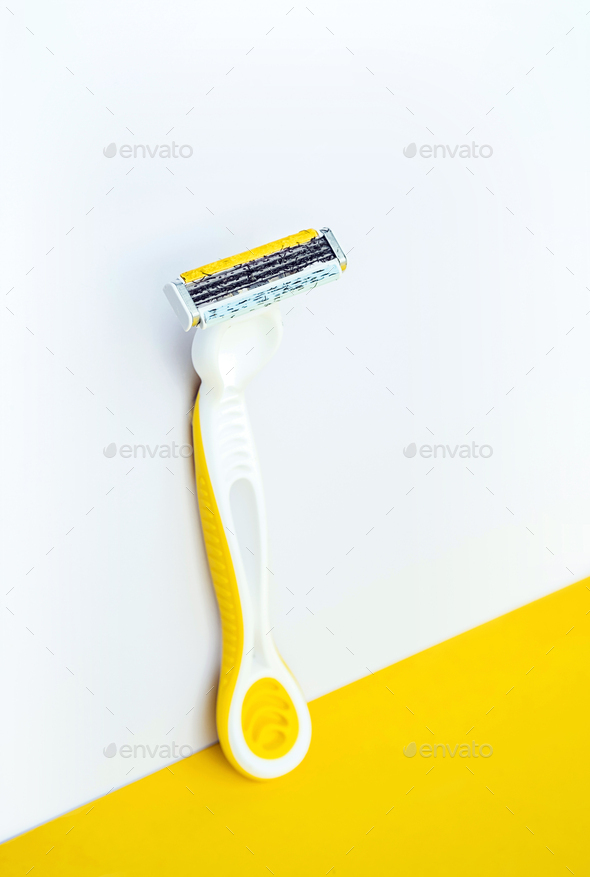 Used disposable razor for safe shaving. Female razor for daily personal hygiene.
